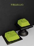Load image into Gallery viewer, Artistic composition of A Letter from Wind matcha yuzu mousse cake.