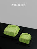 Load image into Gallery viewer, Two A Letter from Wind mousse cakes presented together.