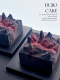 Load image into Gallery viewer, Close-up composition of two Fire of Love mousse cakes.