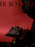 Load image into Gallery viewer, Fire of Love strawberry vanilla mousse cake presented against a dramatic red backdrop.