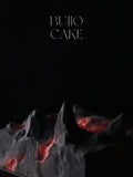 Load image into Gallery viewer, Close-up of the volcanic-inspired sculptural form of Fire of Love mousse cake.