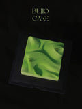 Load image into Gallery viewer, Hero image of Mountain Wind, an architecture-inspired jasmine green grape mousse cake.