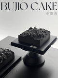 Load image into Gallery viewer, Overview of The Mountain View mousse cake in a minimalist studio setting.